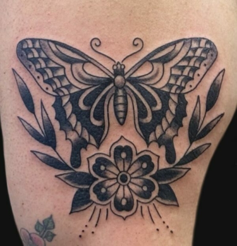traditional butterfly and flower tattoo
