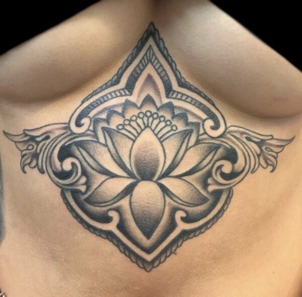 mandala sternum tattoo