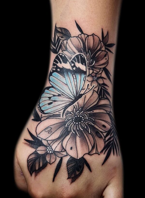 Hand flower butterfly tattoo