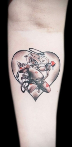 Cupid heart tattoo