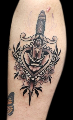 Heart and dagger tattoo