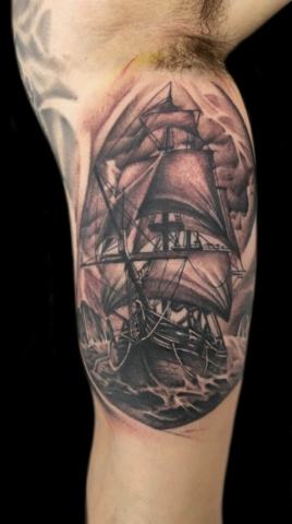 Realistic ship tattoo