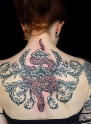snake and filigree tattoo
