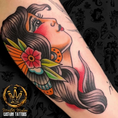 traditional woman tattoo