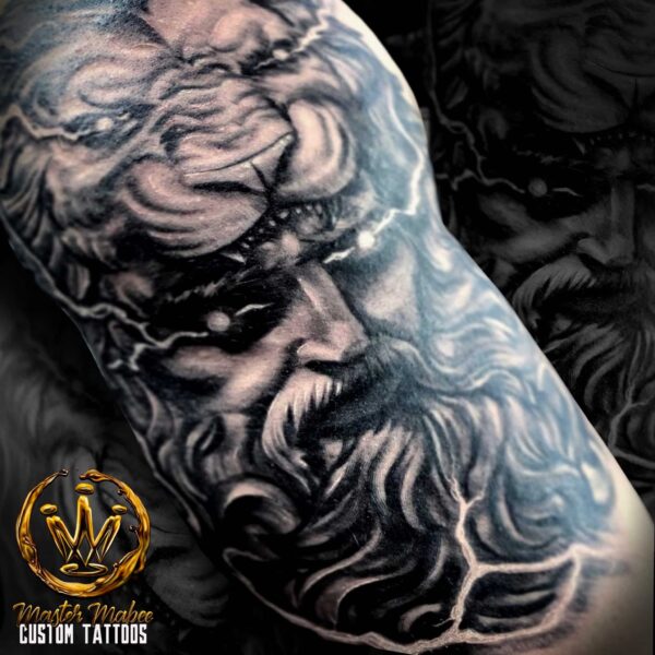 lion and Zeus tattoo
