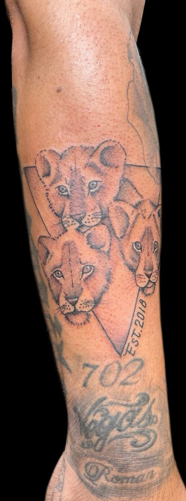 Lion cub tattoo