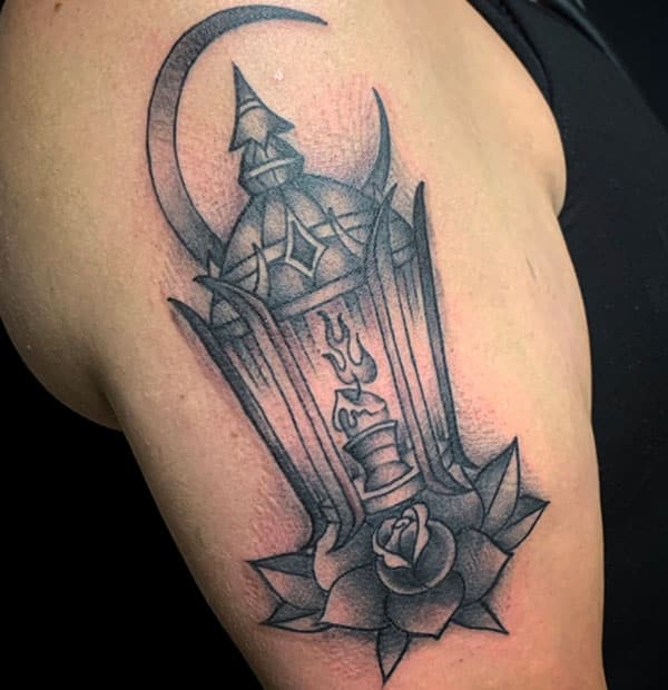 traditional lantern and flower tattoo