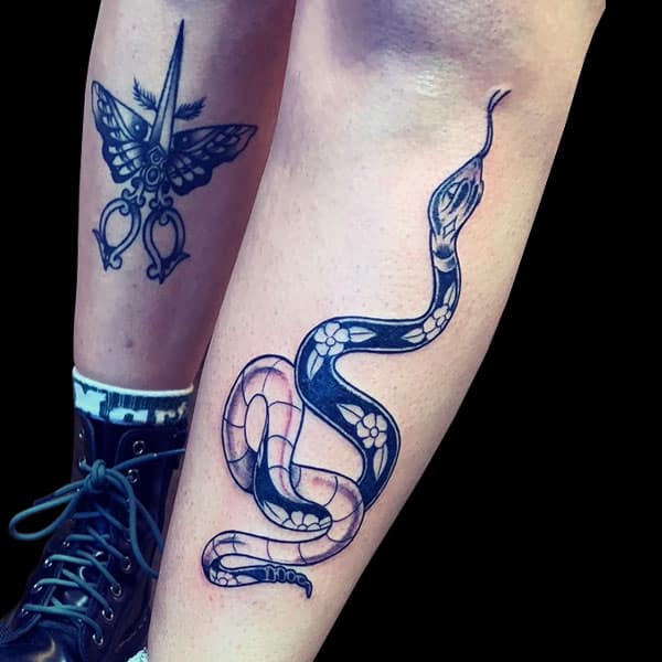 snake and butterfly traditional tattoo
