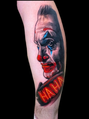 the joker tattoo HAHA tattoo, Tattoo by Chris Beck, artist at Revolt Tattoos