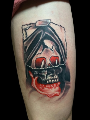 skull playing card tattoo, Tattoo by Chris Beck, artist at Revolt Tattoos