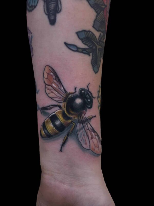 color realistic bee tattoo, Tattoo by Chris Beck, artist at Revolt Tattoos