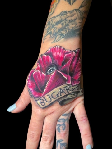 floral hand tattoo design, Tattoo by Chris Beck, artist at Revolt Tattoos