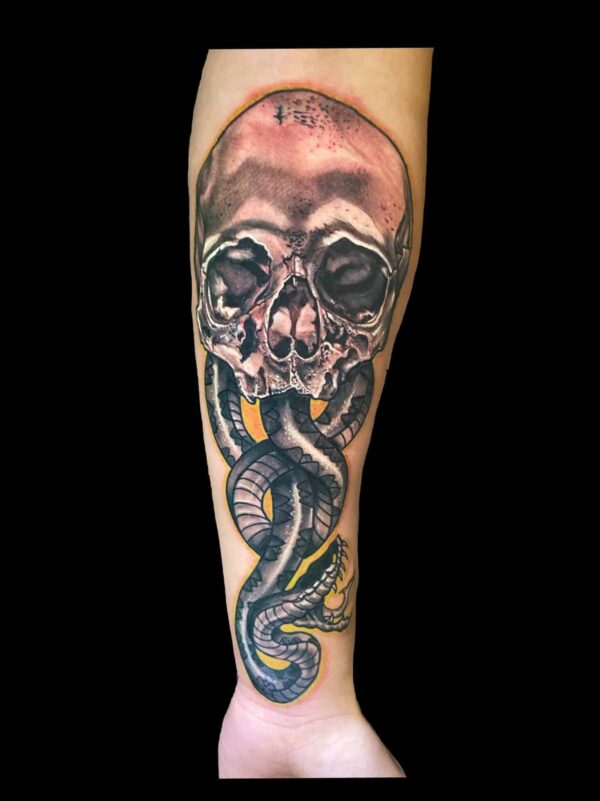 skull and snake tattoo, Tattoo by Chris Beck, artist at Revolt Tattoos