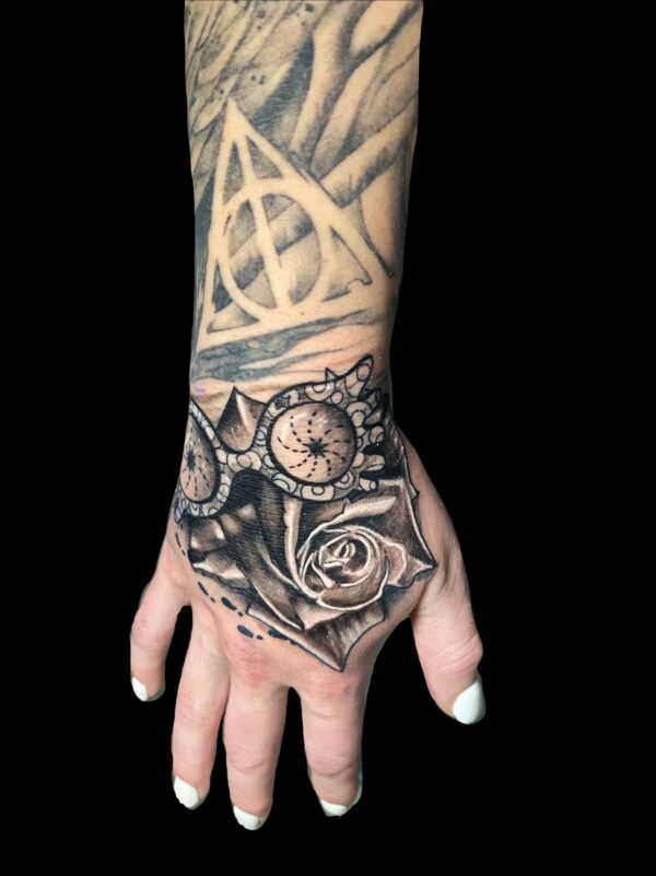 harry potter hand tattoo, Tattoo by Chris Beck, artist at Revolt Tattoos