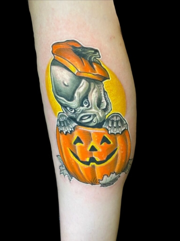 pumpkin and lochness tattoo, Tattoo by Chris Beck, artist at Revolt Tattoos