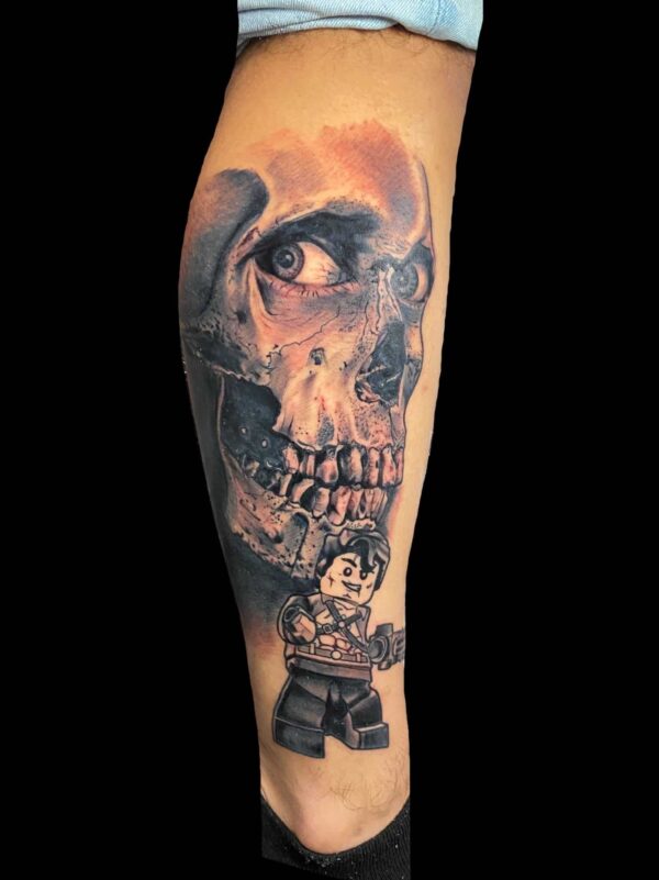 skull lego tattoo, Tattoo by Chris Beck, artist at Revolt Tattoos