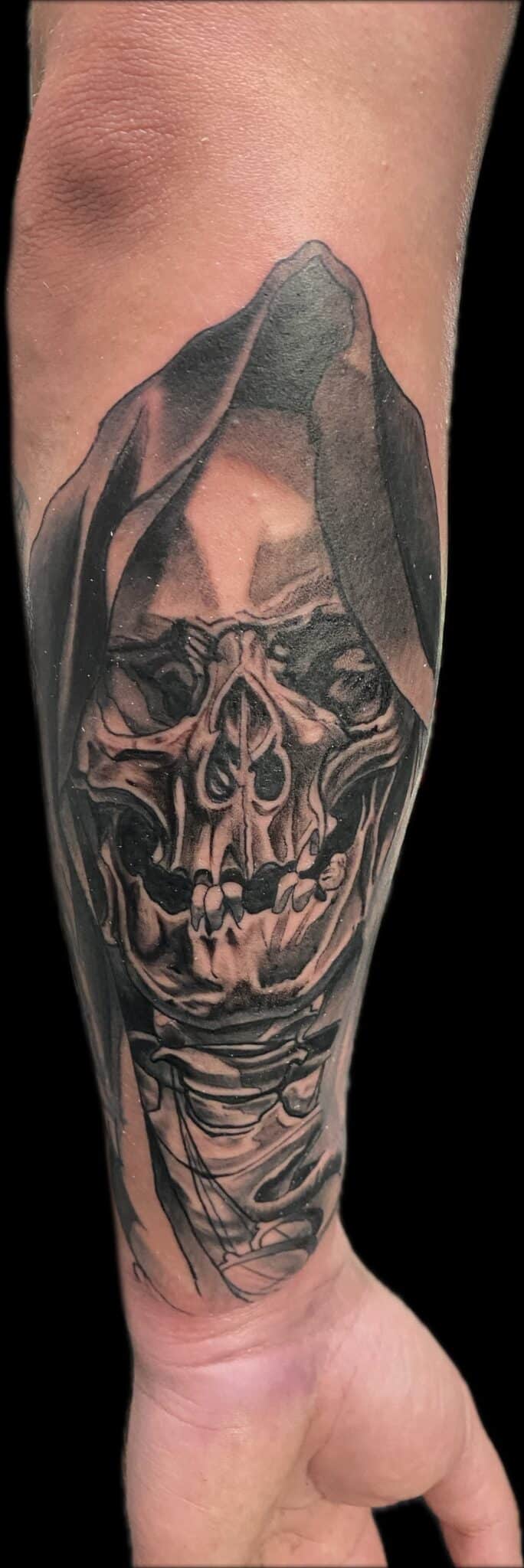reaper tattoo on forearm, Tattoo by Chris Beck, artist at Revolt Tattoos