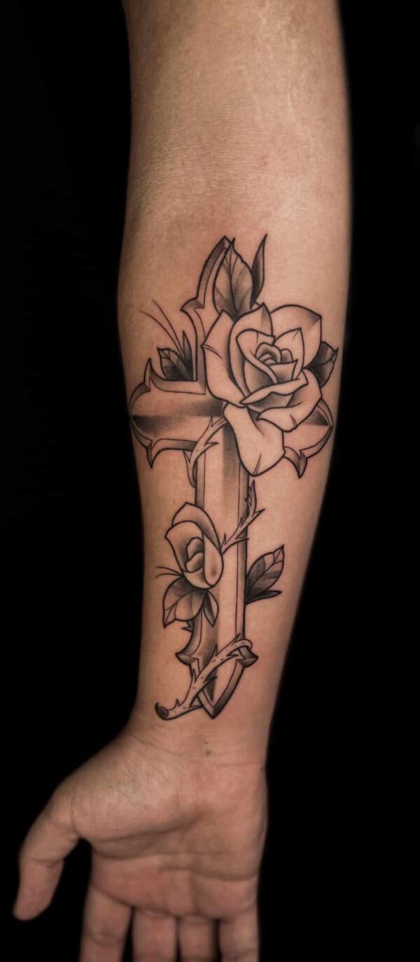 cross and floral tattoo, Demi DiMartino, artist at Revolt Tattoos