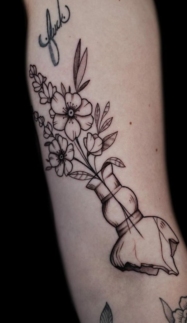 floral black and grey tattoo