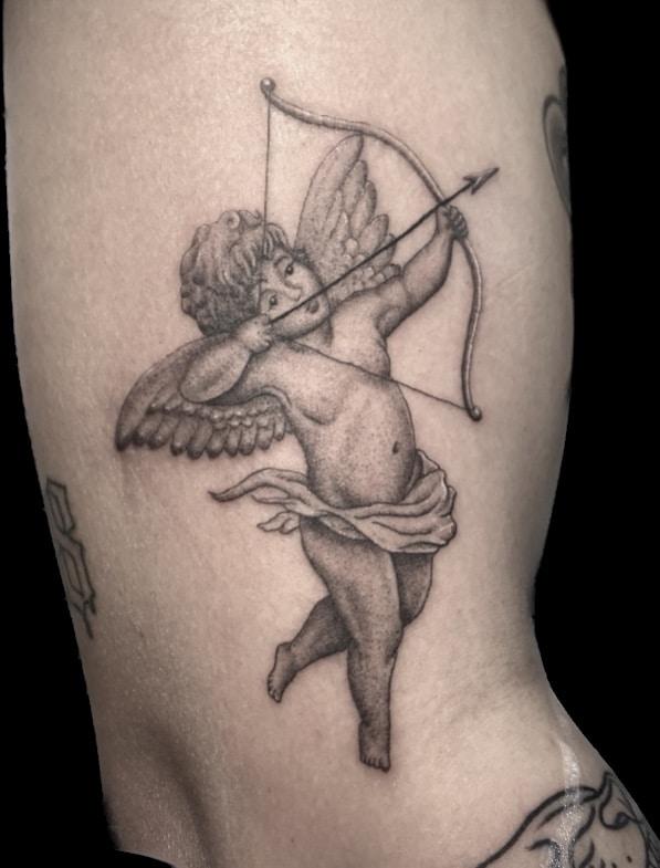 black and grey cherub tattoo, Jackie Gutierrez , Tattoo Artist at Revolt Tattoos in Las Vegas