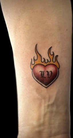 flaming lv heart tattoo, Jackie Gutierrez , Tattoo Artist at Revolt Tattoos in Las Vegas