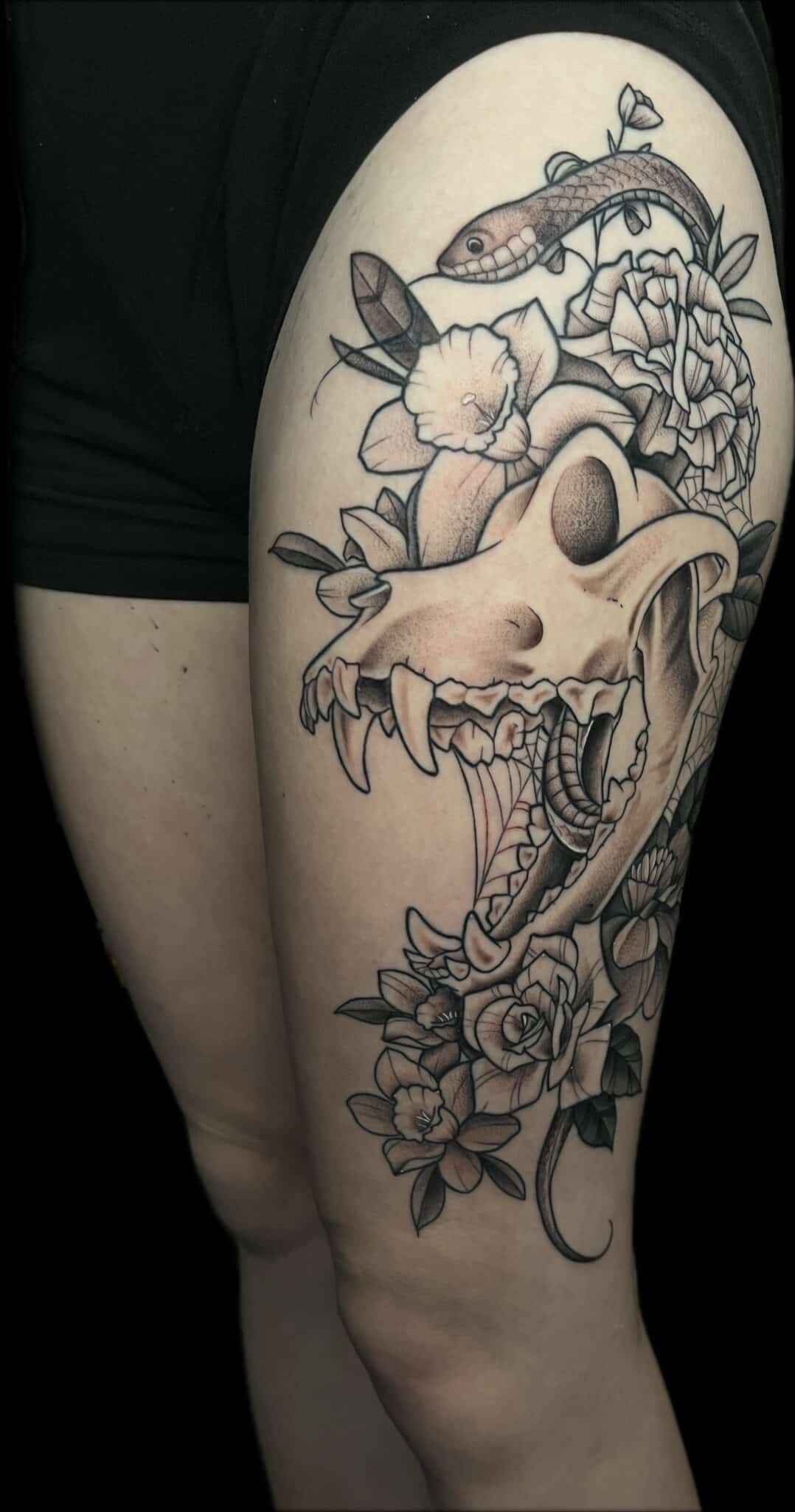 skull, snake and flowers tattoo Demi DiMartino, artist at Revolt Tattoos