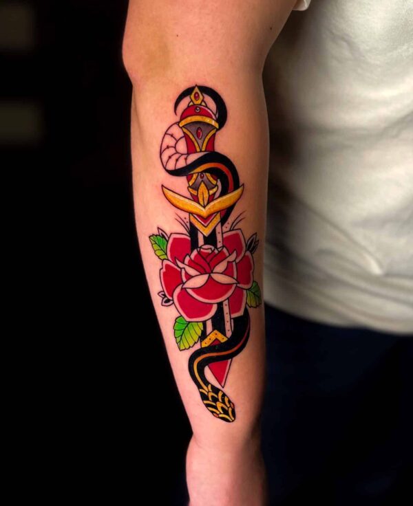 Traditional flower and dagger tattoo, Demi DiMartino, artist at Revolt Tattoos