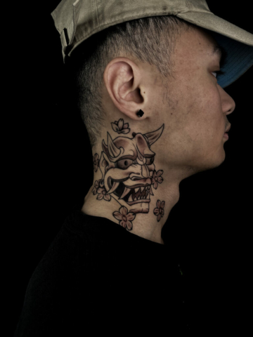 hannya mask neck tattoo, Demi DiMartino, artist at Revolt Tattoos