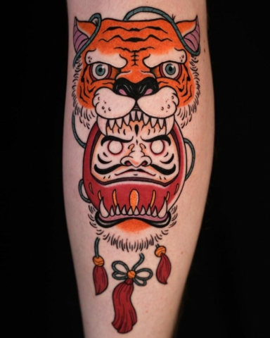 tiger head daruma doll tattoo, Demi DiMartino, artist at Revolt Tattoos