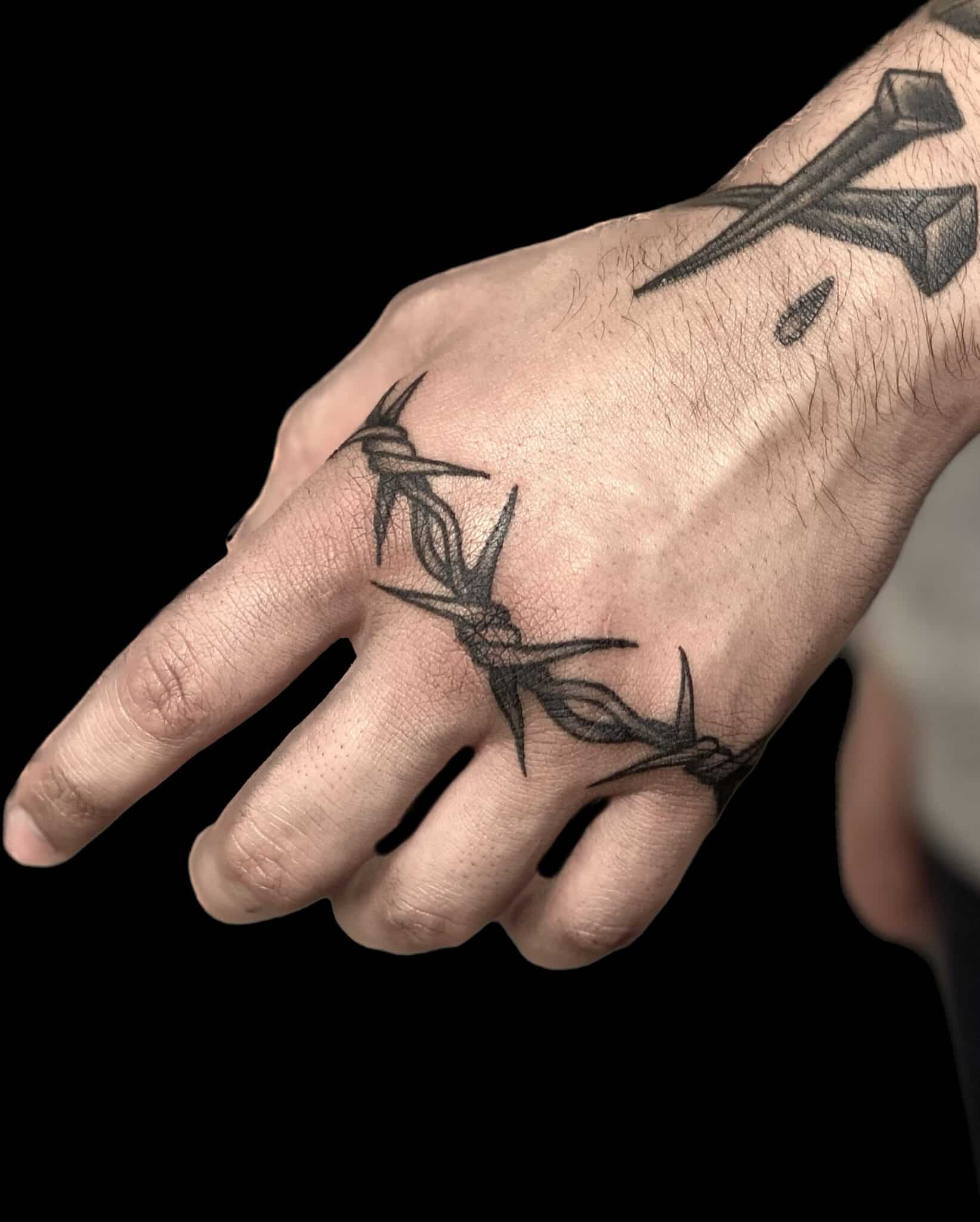 black and grey barbed wire tattoo, Jackie Gutierrez , Tattoo Artist at Revolt Tattoos in Las Vegas