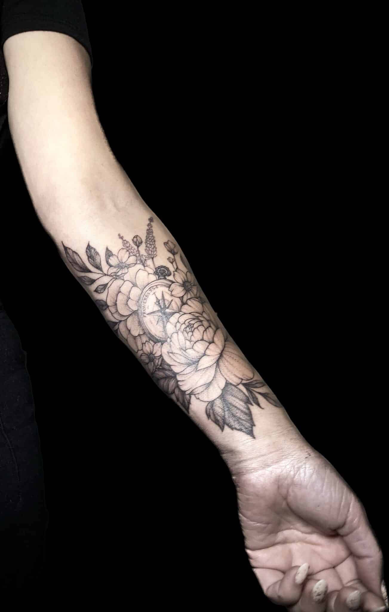 black and grey flower and compass tattoo, Jackie Gutierrez , Tattoo Artist at Revolt Tattoos in Las Vegas