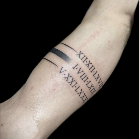 roman numerals, Jackie Gutierrez , Tattoo Artist at Revolt Tattoos in Las Vegas