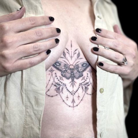 black and grey sternum moth floral tattoo, Jackie Gutierrez , Tattoo Artist at Revolt Tattoos in Las Vegas