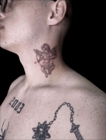 cherub on neck, Jackie Gutierrez , Tattoo Artist at Revolt Tattoos in Las Vegas