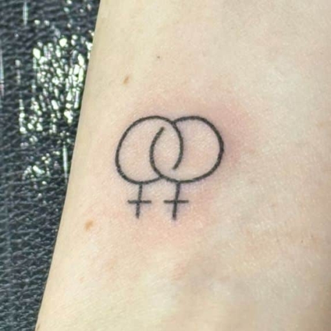 gender sign tattoo