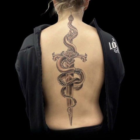 dagger and snake on back, Brooke Lozano, Artist at Revolt Tattoos Houston
