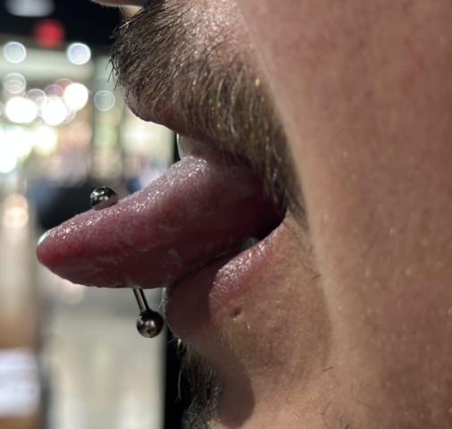 Tongue piercing Gabby Paz | Body Piercer at Revolt Tattoos in Salt Lake City.