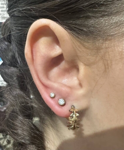 ear lobe piercing | Gabby Paz | Body Piercer at Revolt Tattoos in Salt Lake City.