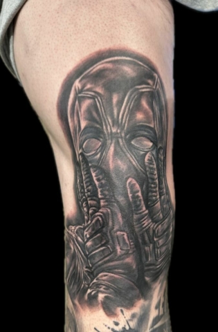 Black and grey Deadpool tattoo