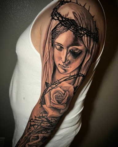 Virgin mary religious tattoo