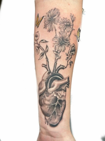 Heart with flowers tattoo